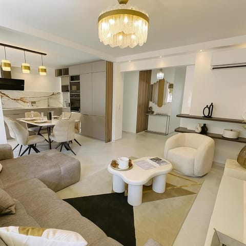 Bed, TV and multimedia, Living room, Seating area, Dining area