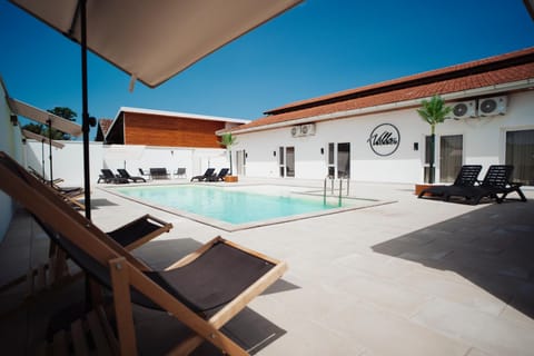 Property building, Patio, Day, Pool view, Swimming pool, sunbed