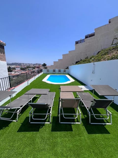 Patio, Day, Natural landscape, Pool view, Swimming pool, sunbed