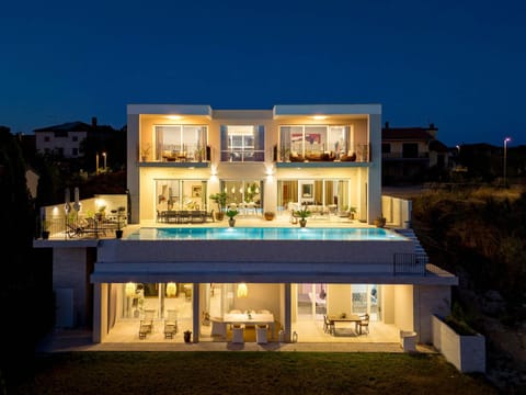 Property building, Patio, Night, View (from property/room), Balcony/Terrace, Swimming pool, sunbed