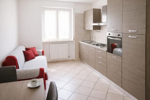 Kitchen or kitchenette, Living room, Seating area, oven, stove, kitchen