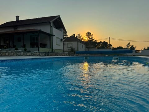 Property building, Pool view, Swimming pool, Sunset