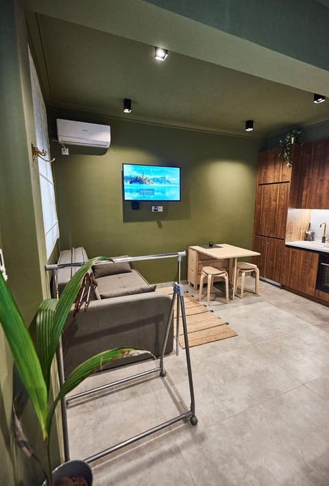 TV and multimedia, Kitchen or kitchenette, Living room, Seating area, Dining area, air conditioner