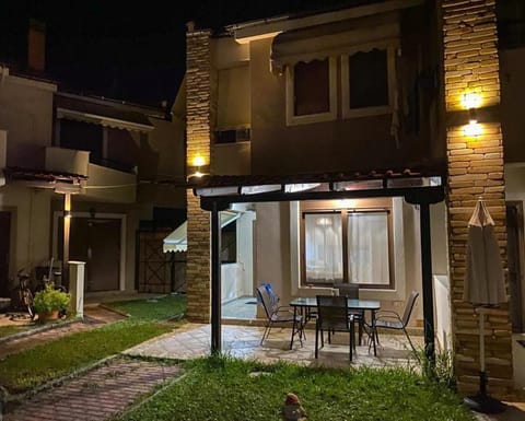 Property building, Patio, Night, Garden, Balcony/Terrace