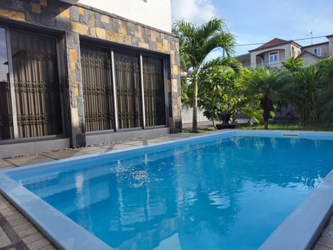 Property building, Day, Pool view, Swimming pool