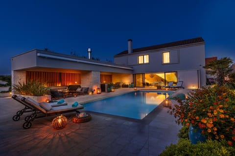 Property building, Patio, Night, Garden, Garden view, Pool view, Swimming pool, sunbed