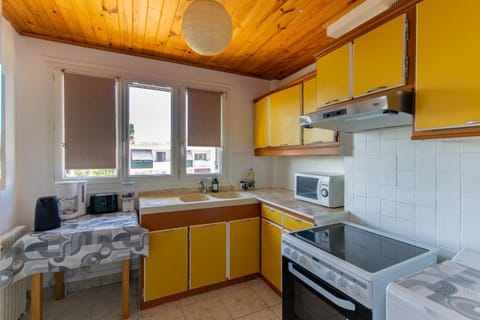 Kitchen or kitchenette, oven, stove, toaster
