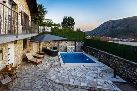 Property building, Pool view, Swimming pool, sunbed