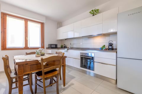 Dining area, dishwasher, oven, stove, kitchen
