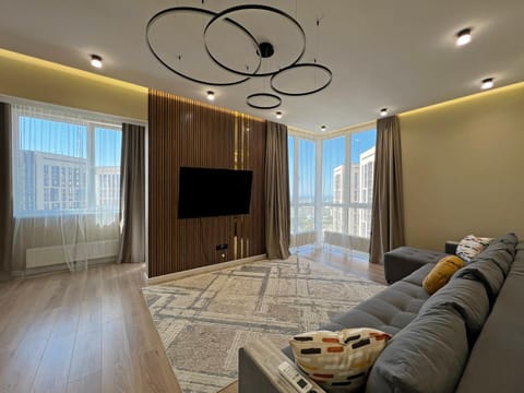 TV and multimedia, View (from property/room), Living room, Seating area, City view