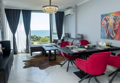 Natural landscape, Living room, Seating area, Dining area, Sea view