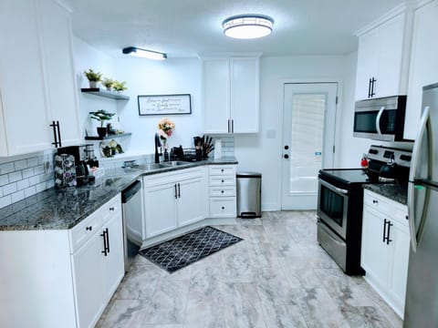 Kitchen or kitchenette, dishwasher, oven, toaster
