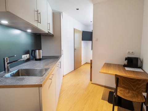 Kitchen or kitchenette, Photo of the whole room, Dining area, stove, kitchen