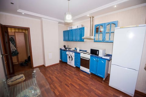 Kitchen or kitchenette, stove, washing machine