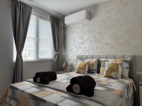 Bed, Photo of the whole room, Bedroom, towels, air conditioner