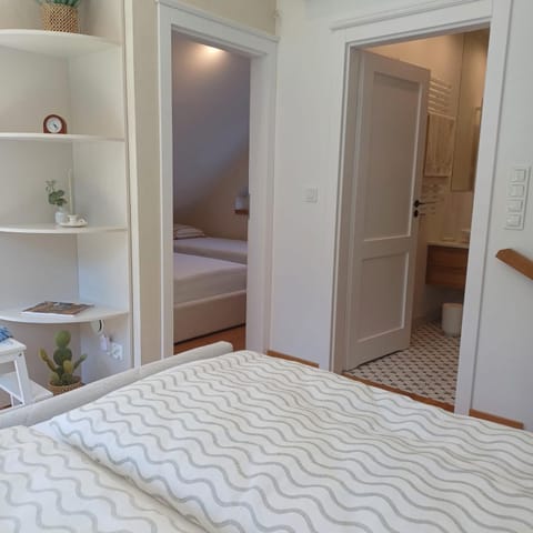 Seating area, towels, wardrobe