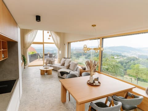 Natural landscape, View (from property/room), Living room, Seating area, Dining area, Mountain view