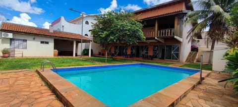 Property building, Patio, Day, Garden, Garden view, Pool view, Swimming pool