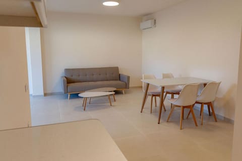 Living room, Seating area, Dining area, air conditioner