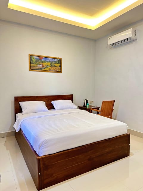 Bed, air conditioner