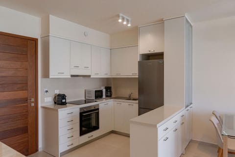 Kitchen or kitchenette, oven, stove, toaster