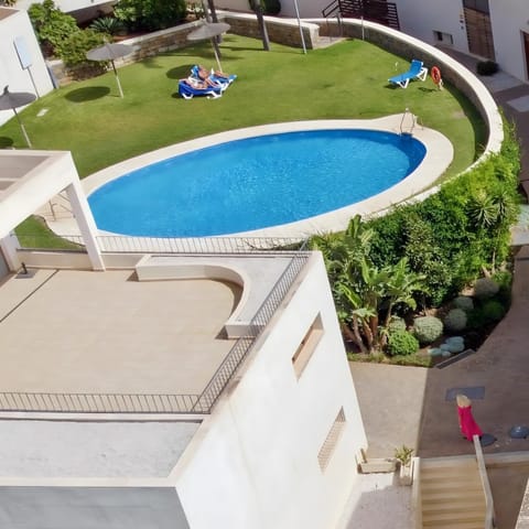 Property building, Living room, Swimming pool