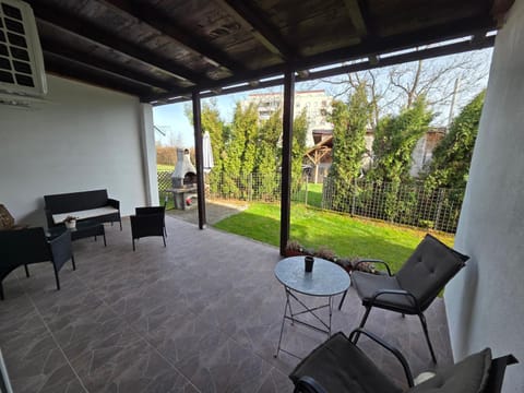 View (from property/room), Balcony/Terrace, Seating area, Garden view