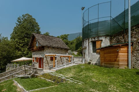 Property building, Natural landscape, Garden, Mountain view, sunbed