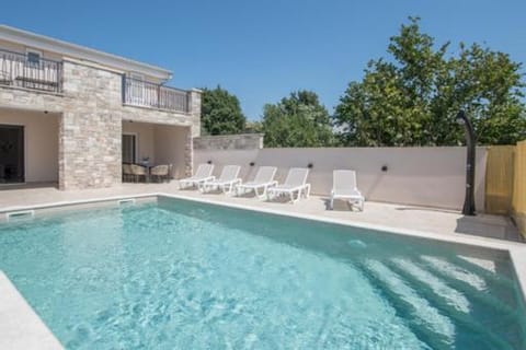 Property building, Pool view, Swimming pool, sunbed