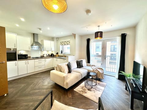 TV and multimedia, Kitchen or kitchenette, Living room, Seating area, dishwasher, stove, toaster