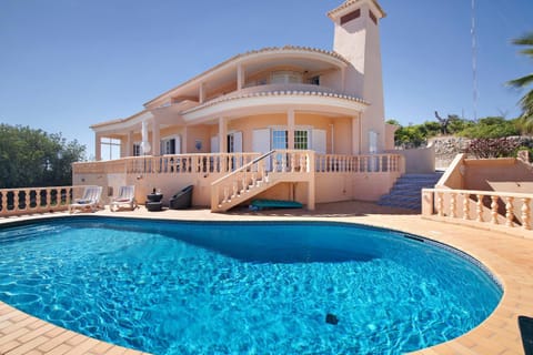 Property building, Living room, Swimming pool