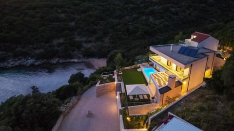 Property building, Night, Natural landscape, Bird's eye view, Pool view, Swimming pool