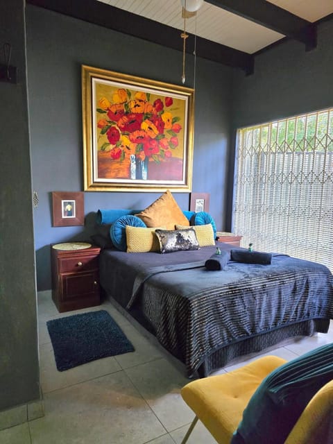 Bedroom, hair dryier, towels, wardrobe