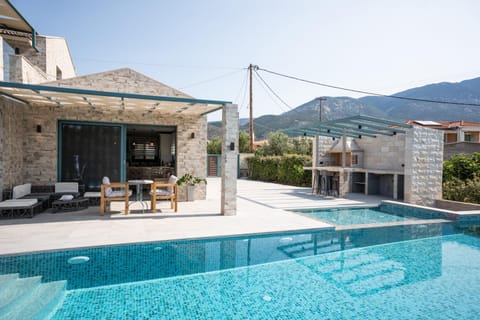 Property building, Patio, Mountain view, Pool view, Swimming pool, sunbed