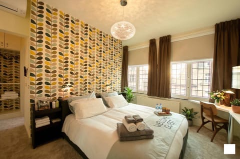Bed, Photo of the whole room, Bedroom, towels, air conditioner