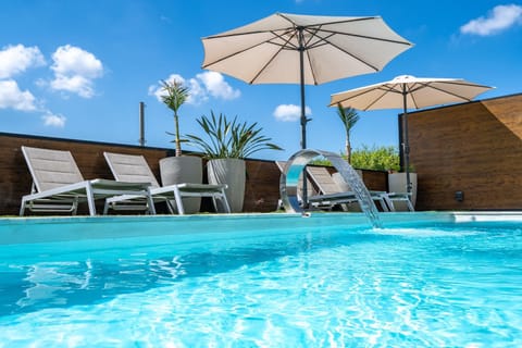 Patio, Day, Pool view, Swimming pool, sunbed