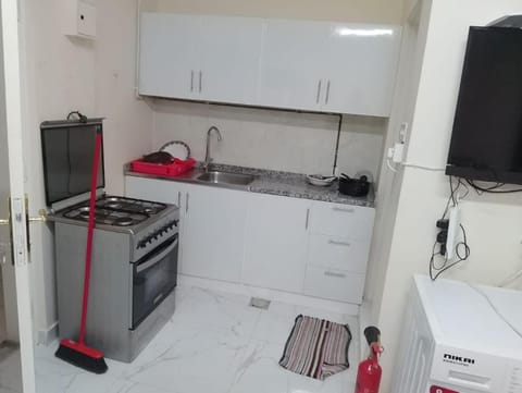 Kitchen or kitchenette, oven