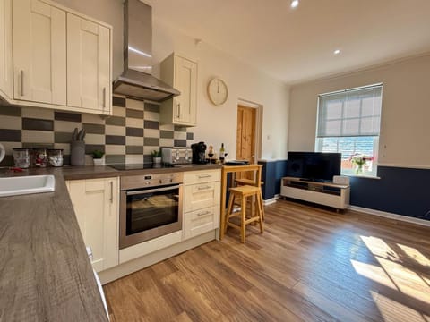 Kitchen or kitchenette, Living room, Dining area, stove