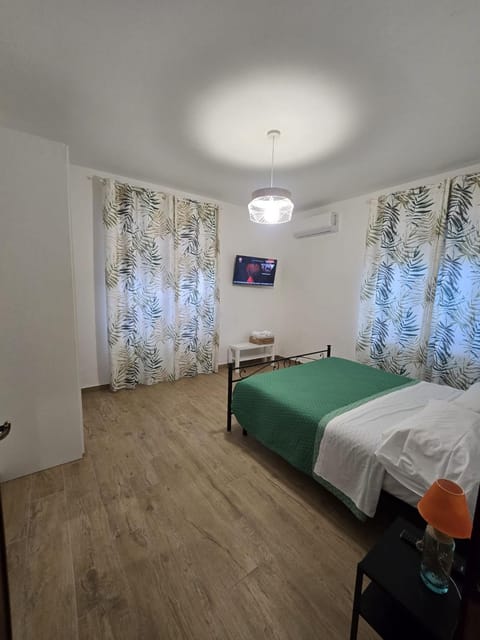 Bed, Photo of the whole room, Bedroom, towels, air conditioner