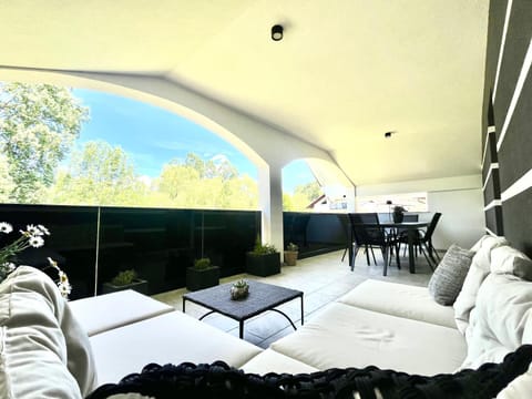 View (from property/room), Balcony/Terrace, Seating area, Evening entertainment