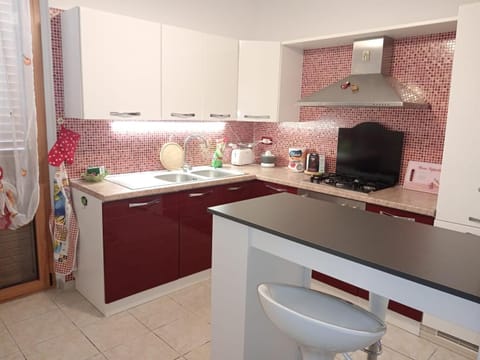 Kitchen or kitchenette, oven, stove, toaster