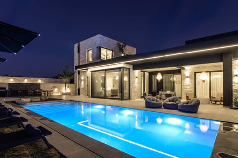 Property building, Patio, Night, Pool view, Swimming pool, sunbed