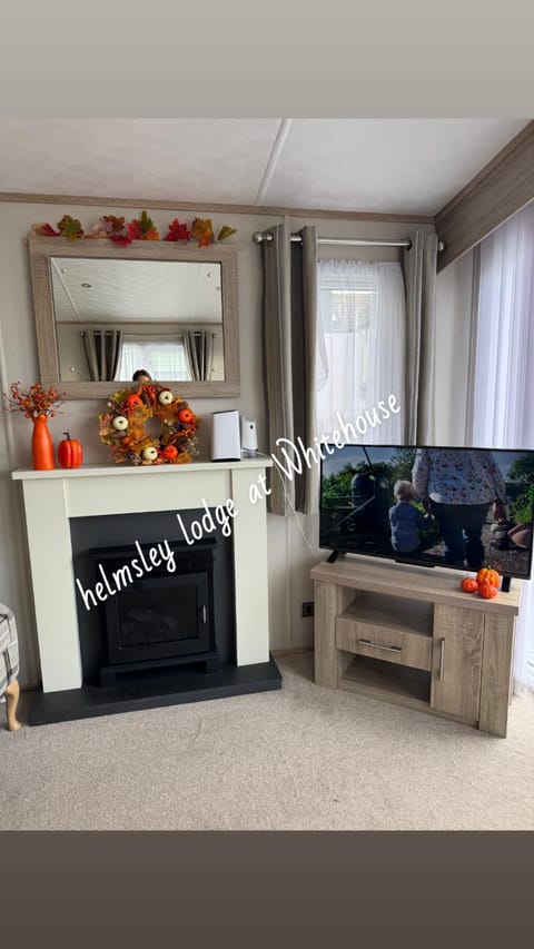 Lodge at Whitehouse leisure park Campground/
RV Resort in Towyn