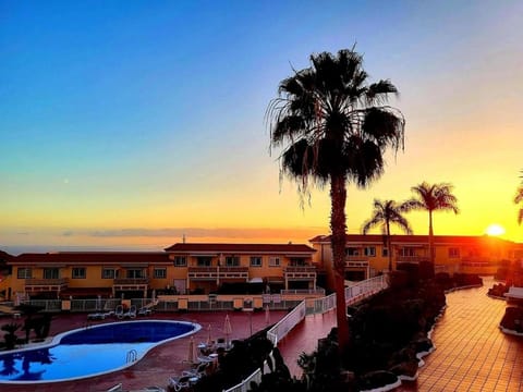 Property building, Natural landscape, Pool view, Sunset