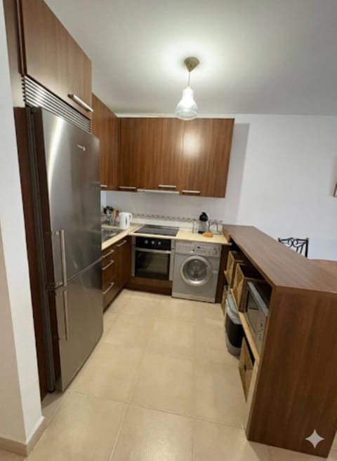 Kitchen or kitchenette, oven, stove