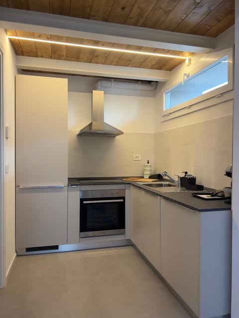 Kitchen or kitchenette, stove