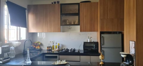 Kitchen or kitchenette, oven