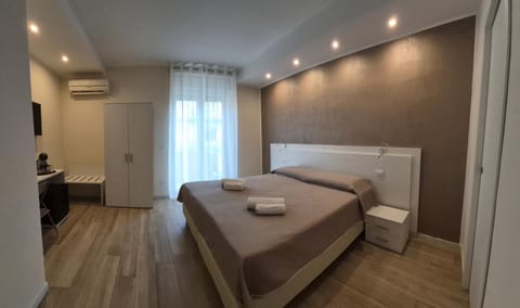 Bed, Photo of the whole room, Bedroom, towels, air conditioner