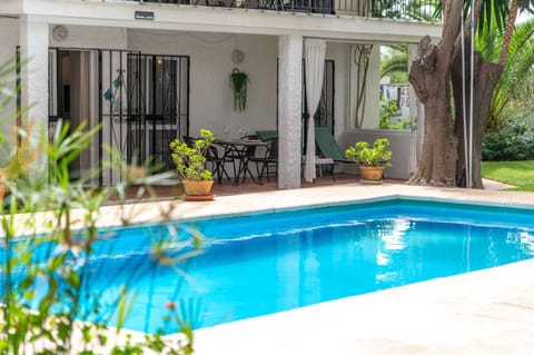 Property building, Living room, Swimming pool