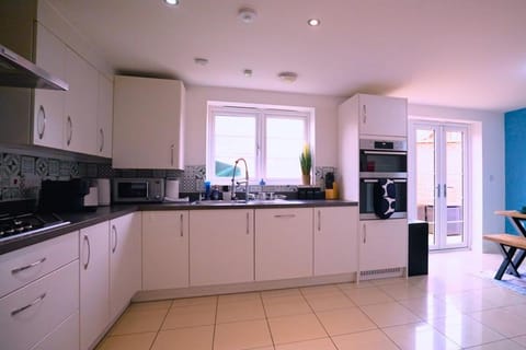 Kitchen or kitchenette, stove, toaster